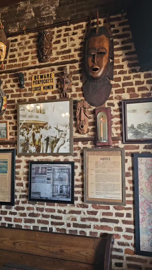 The Under-the-Hill Saloon is a historic dive bar in Natchez, Mississippi, located in the old riverfront district, known for its lively atmosphere, live music (blues, rock, country), and strong drinks. Housed in one of the oldest buildings in the area, it has a notorious past as a port for riverboat gamblers, prostitutes, and thieves, giving it a unique, old-school charm with features like dollar bills tacked to the ceiling. It's a popular spot for both locals and tourists, offering a classic Mississippi riverfront experience with views of the Mississippi River. 
Key features
Historic building: The structure dates back to the late 1700s or early 1800s and has served as a brothel, warehouse, and general store. 
Live music: A major draw, featuring various genres like blues, bluegrass, and rock. 
Atmosphere: A classic dive bar with a "hole in the wall" feel, dark wood, and a mix of patrons. #golfstagram #saloons  #visitnatchez #visitms #couplesgoals